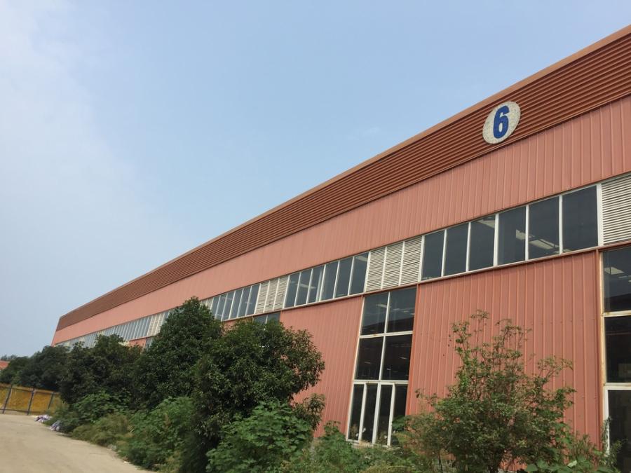 四川省广汉市高雄路的一宗国有土地使用权及附属的工业用房